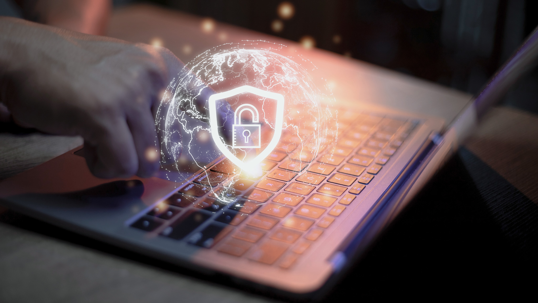 Cyber Security Internet And Networking Concept. Businessman Hand Working With laptop computer and virtual Screen Padlock Icon. Digital crime by an anonymous hacker, data protection.